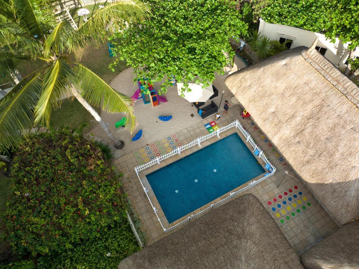 Constance Belle Mare Plage Exterior photo Swimming pool at the school
